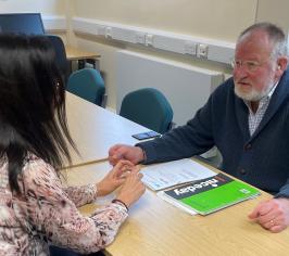 Cllr Simpkins at the Appleby Horse Fair drop in event held at in the town's library